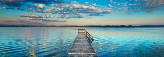 Boat ramp and filigree clouds, Bavaria, Germany