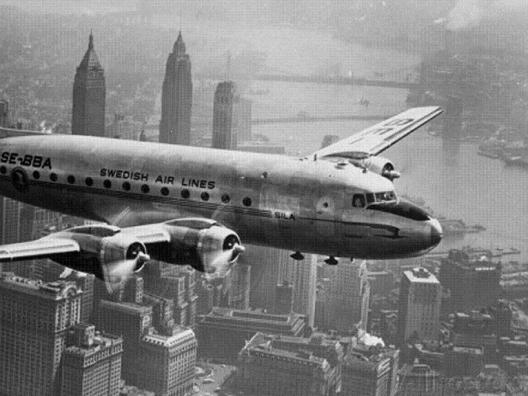 Aircraft Flying Over City 1946
