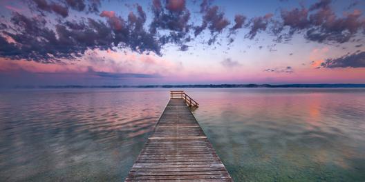 Boat ramp and filigree clouds, Bavaria, Germany