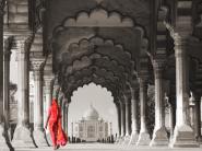 Woman in traditional Sari walking towards Taj Mahal (BW)